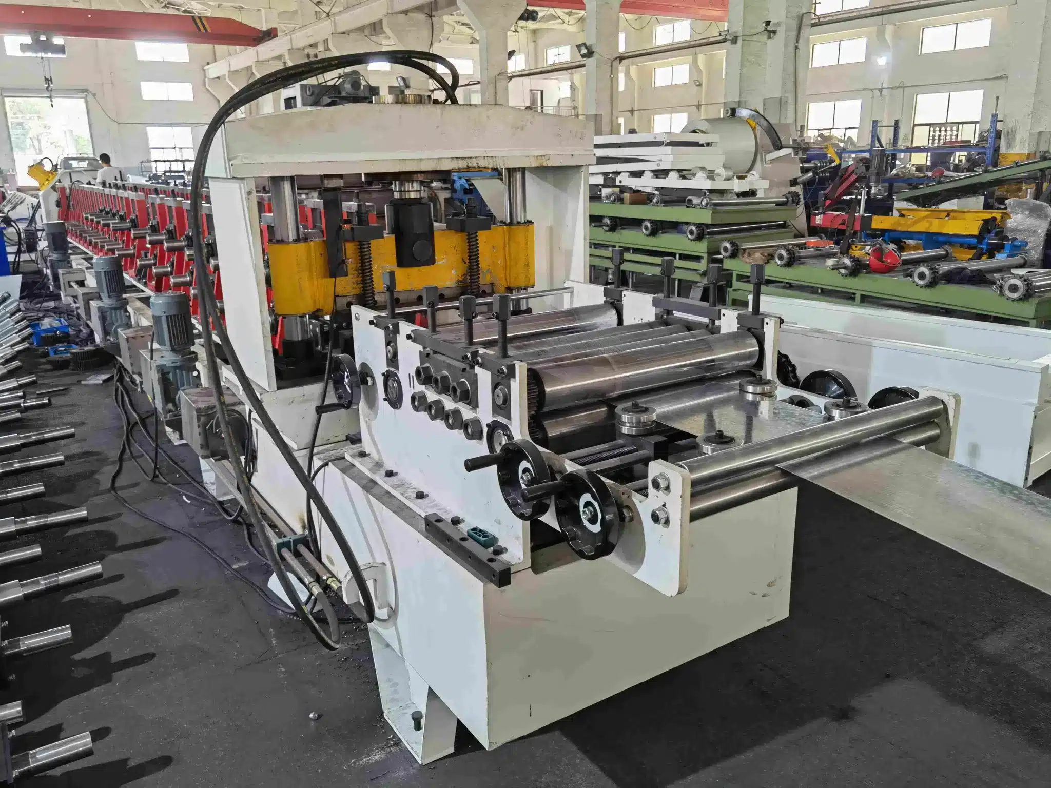 box beam machine feeder and pre-cutter