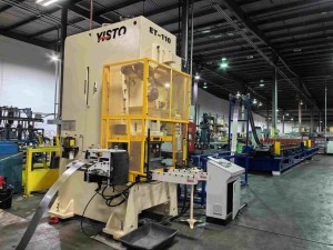 Servo feeder and punch press preparing material for roll forming.
